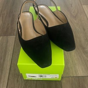 Flat slip on black suede